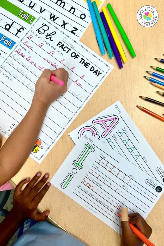 Students practicing handwriting and sentence formation with tracing worksheets, a helpful support strategy for struggling writers learning letter formation and spacing.