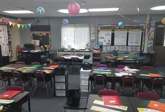 Chalkboard brights theme with rainbow accents and gray walls.