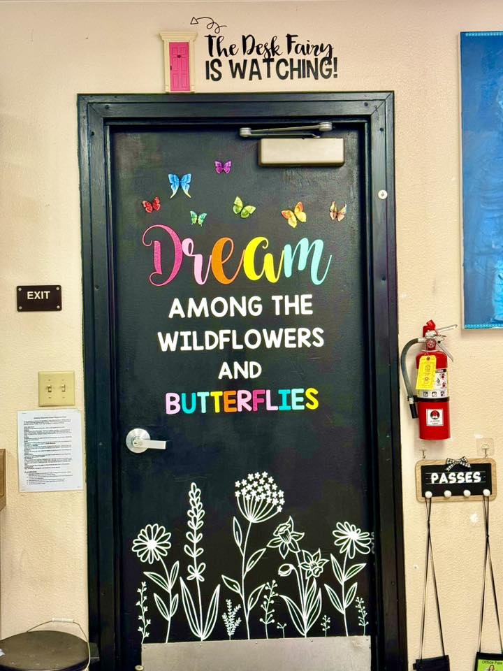 "dream among the wildflowers and butterflies" decorated classroom door