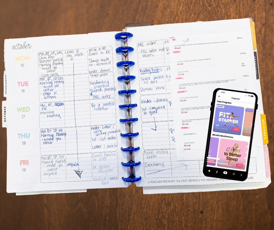 The fiton app displayed on a teacher's cell phone on top of her planning book.