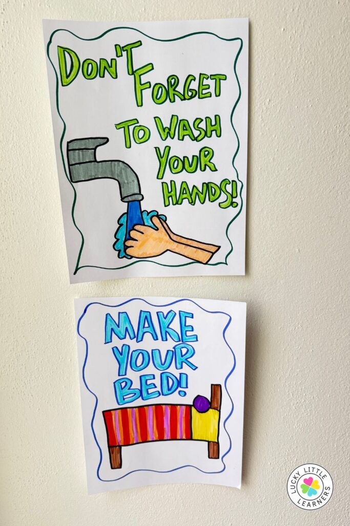 Hand-drawn classroom posters reminding students to wash their hands and make their bed, used for teaching responsibility and hygiene in an engaging visual way.