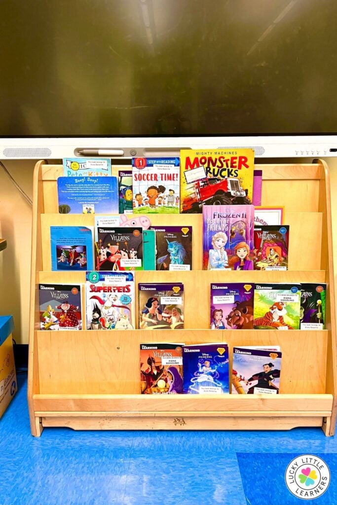 New kindergarten teacher classroom library featuring front-facing bookshelves filled with picture books to encourage independent reading.
